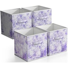 three purple storage bins with handles on each side