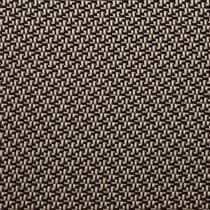 an up close view of a woven fabric with black and white squares on the side