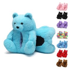 a blue teddy bear sitting next to several pairs of baby booties