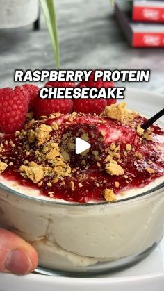 raspberry protein cheesecake in a bowl with the words, raspberry protein cheesecake