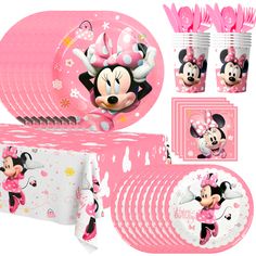 a minnie mouse party set with pink plates, napkins and cupcakes on a white background