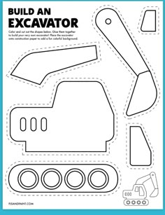 an excavator cut out from paper with scissors and other items to make it