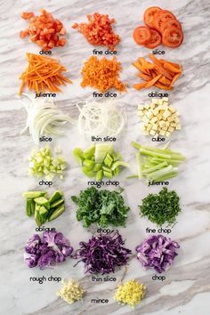 the ingredients for this vegetable salad are laid out on a white marble counter top, including carrots, celery, onions, and other veggies