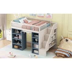 a child's loft bed with stairs and bookcases on the bottom level