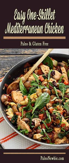 a skillet filled with chicken, spinach and other vegetables