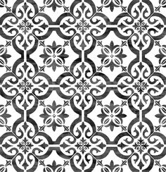 an artistic black and white tile design