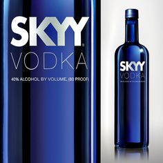 a bottle of sky vodka next to a blue bottle with the word vodka on it