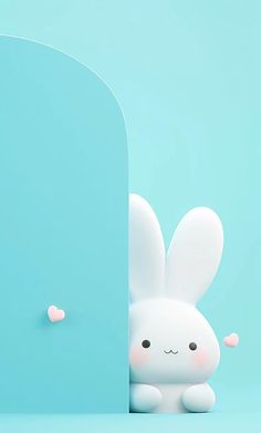 a white rabbit peeking out from behind a blue wall