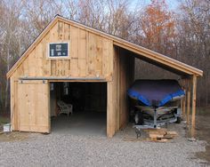 a garage with a boat in it