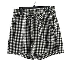 New With Tags Bloom Chic Gingham Shorts In Black And White. Elastic Waist With Ties, Pockets, Loose, Longer Fit. Size 14-16. Waist: 17-1/2" Across Unstretched Rise: 14-1/2" Inseam: 5-1/4" Condition: New With Tags Bloom Chic, Chic Shorts, Gingham Shorts, Plaid Tie, White Plaid, Gingham, Elastic Waist, High Waist, Plaid