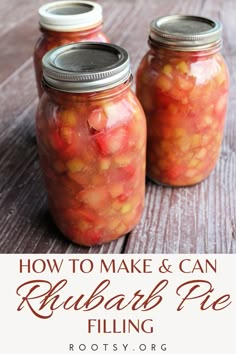 two jars filled with pickled vegetables sitting on top of a wooden table