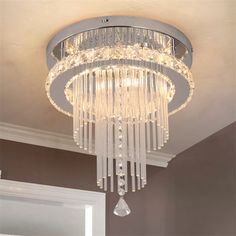 a crystal chandelier hanging from the ceiling