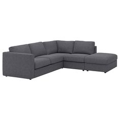 a gray sectional couch with the corner facing it