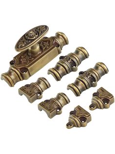 an assortment of antique style door handles and knobs