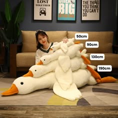 Looking for the perfect gift for a child or stuffed animal lover in your life? Look no further! Our Giant Lying Duck Plush Toy is sure to be a hit. Made of soft, cuddly materials, this adorable animal is great for snuggling and playtime. Available in three colors – brown, grey, and white – and four sizes, you're sure to find the perfect fit. Not only is it cute and fun, but it's also durable and easy to clean. Give the gift of love and laughter with this sweet stuffed duck. Goose Plush, Big Pillow, Construction Lego, Australian Gifts, Channeling Energy, Duck Toy, White Goose, White Ducks, Body Pillow