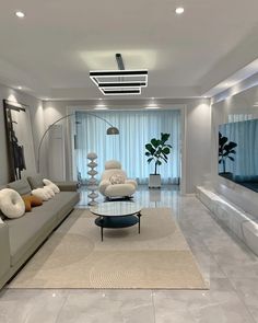 a modern living room with white walls and flooring