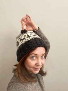 This is a cozy, winter-ready beanie featuring traditional Fair Isle motifs with playful reindeer designs. This charming hat is perfect for anyone who loves classic, Nordic-inspired knitwear. With its warm, double-brim ribbing and intricate colorwork, it offers both style and comfort.  Head circumference:  54-56cm (21"-22"). Materials: * DROPS Nepal (65% Wool, 35% Alpaca): 2 balls of main color, and 1 ball of contrasting color. * 3.50mm (US 4) and 4.00mm (US 6) Circular Needles (or Double Pointed Needles, if preferable); It is worked in the round from the bottom up. The chart is worked using the stranded color work method.  Skill Level: Intermediate.  Language: English. Designed with love for kind and cheerful people. Fair Isle Knit Hat, Motif Fair Isle, Gift Card Craft, Hat Knitting Pattern, Hat Knitting, Double Pointed Needles, Hand Knit Hat, Fair Isle Knitting, Circular Needles