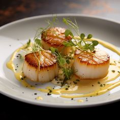 three scallops on a white plate with sauce and garnishes around them