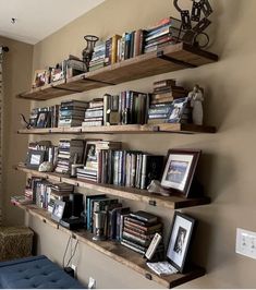 the bookshelves are filled with many different types of books and pictures on them