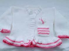 cute knitted baby girls cardigan is the perfect little girls outfit, it matches perfectly with all your other baby clothes, jeans, dresses & leggings and has been a very popular choice  This knitted baby girl Jacket also makes a great gift for new moms, a beautiful coming home baby outfit or to give as a baby shower gift Girls holiday sweater, Girls Christmas sweater or Little girl wedding clothes All my baby knitwear is hand knitted in soft acrylic baby yarn the main colour is silver and you ca Cute Fitted White Sweater, White Fitted Cute Sweater, Cute Fitted Cardigan For Autumn, Cute Fitted Fall Cardigan, Cute White Knitted Outerwear, Fitted Cute Knit Cardigan, Winter Hand Knitted White Top, Fitted Knit Cardigan In Cute Style, Cute Fitted Knit Cardigan