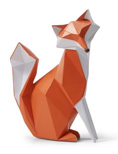 an orange and white origami fox sitting down