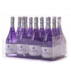 six bottles of purple wine in a clear display case on a white background with the words bubblesy printed on it