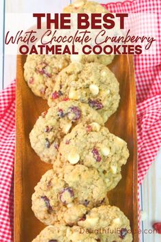 the best white chocolate cranberry oatmeal cookies on a wooden tray