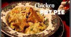 chicken pot pie on a white and black plate