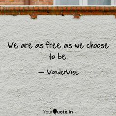 a brick wall with a quote on it that says, we are free as we choose to be