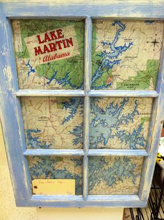 the lake martin window is painted blue and has an old map on it's side