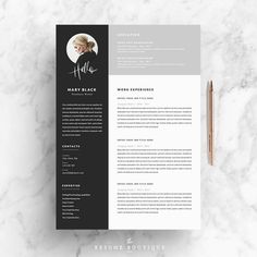 a black and white resume template on top of a marble table with a pencil next to it