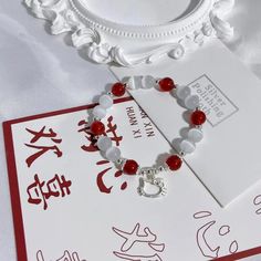 Kitty Red Bracelet Add a touch of cuteness to your style with our 可爱的 Kitty Red Bracelet. The charming kitty design will bring a smile to your face while the red color adds a pop of color to your outfit. Perfect for any cat lover, this bracelet is a must-have accessory. Eye Bracelet, Sanrio Fashion, Red Charm, Red Beaded Bracelet, Hello Kitty Accessories, Hello Kitty Clothes, Cute Presents, Show Appreciation, Red Bracelets