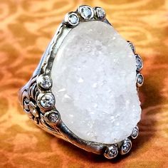 R2942 "Beauty In The Rough" Ring With Cubic Zirconia And Druzy Set In An Ornate Sterling Silver Band. Size 7. Beautiful Eye-Catcher! Rough Ring, Beautiful Eye, Silpada Jewelry, 7 Rings, Ring Color, Sterling Silver Bands, Beautiful Eyes, Druzy Ring, Womens Jewelry Rings