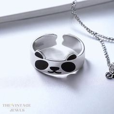 Silver Trendy Panda Ring, Stainless Steel Panda Ring, Adjustable Cartoon Ring, Cute Dainty Ring, Stackable Rings, Ring Collection Material: Stainless Steel, Silver  Free & Fast Shipping (10-15 days delivery) Refunds: Full refunds will be issued exclusively within the first 10 days after delivery and strictly for damaged products. We may consider a Partial refund under certain circumstances NOTE: Panda Rings are handmade so there may be very little imperfections that don't affect its overall shap Cartoon Ring, Panda Ring, Paper Rings, Paper Ring, Zierlicher Ring, Ring Collection, Dainty Ring, Ring Collections, Stackable Rings