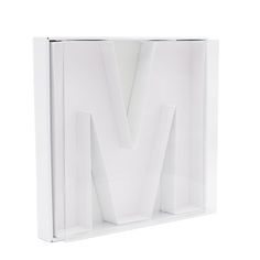 the letter m is made out of white paper