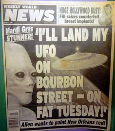 the front page of news paper with an alien on it