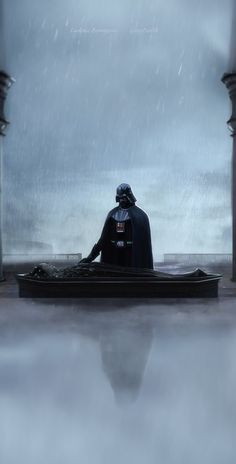 darth vader sitting in a boat on the water with his back turned to the camera