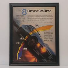 an advertisement for the porsche 924 turbo car is displayed in a black frame on a white wall