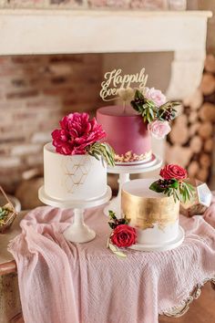 three different cakes sitting on top of a table