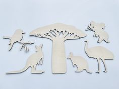 wooden cutouts of various animals and trees