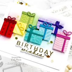 a birthday card with colorful gift boxes on it