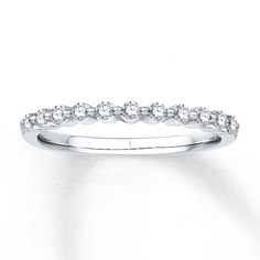 a white gold wedding band with diamonds