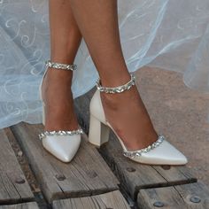 For our Bridal Collection click here: https://www.etsy.com/shop/LovelyBrideByAnna #PLEASE LEAVE YOUR CONTACT NUMBER UPON CHECK OUT# CHOOSE DHL EXPRESS - 1-4 DAYS DELIVERY - EU ESTIMATED TIME: 1-2 DAYS WITH DHL EXPRESS SHIPPING - USA & NON EU ESTIMATED TIME: 2-4 DAYS Handmade to order premium wedding heels 'GLAM'-Handcrafted in Greece Our pearly ivory leather heels 'Empress' will have you turnin' heads and stopping traffic all season long! Add a bit of glam to ensembles in need of a boost! Also p Glam Wedding Shoes, Block Heels Wedding, Embellished Wedding Shoes, Wedding Shoes Bride, Crystal Shoes, Wedding Shoes Heels, Bridal Heels, Wedding Dress Accessories, Ankle Strap Pumps