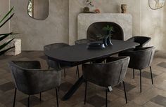 a dining room table with chairs around it