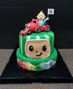 there is a cake that looks like it has a car on the front and side