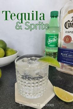 tequila and spirite cocktail with limes on the side