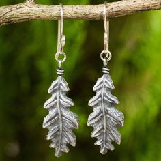 Thailand's Withaya Cheunjit shares the beauty of nature with earrings shaped like oak tree leaves. The sterling silver earrings are crafted by hand with oxidized contrasts. Earrings Exotic, Silver Dangle Earrings, Sterling Silver Cuff Bracelet, Sterling Silver Dangle Earrings, Sterling Silver Cuff, Silver Cuff Bracelet, Silver Earrings Dangle, Jewelry Packaging, Silver Cuff