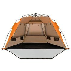 an orange and brown tent with the door open