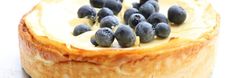 a baked pastry with blueberries on top