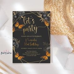 a black and gold birthday party card with butterflies on it, next to straw hat